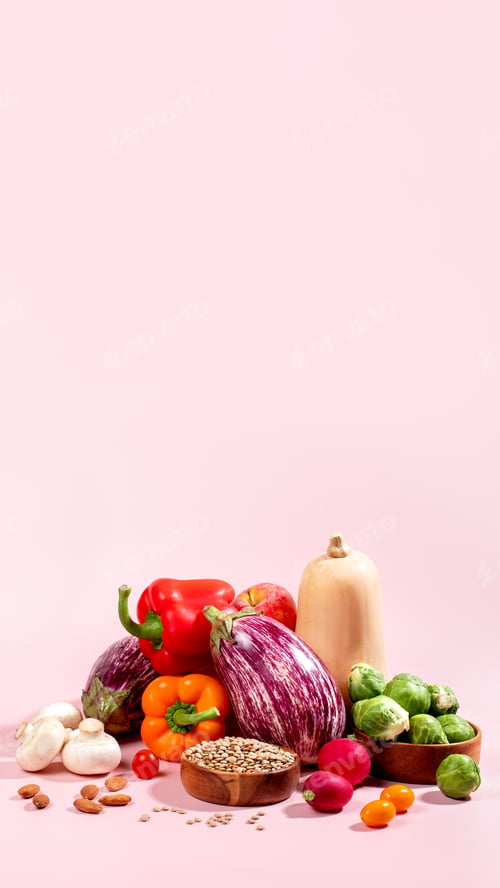 Preview: Vegan card with fresh seasonal autumn vegetables, vegan fall still life on pink