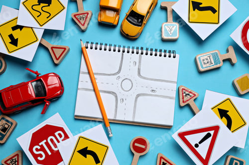 Preview: Road signs and vehicles on a blue background.