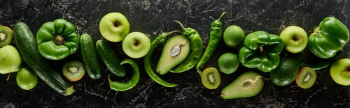Preview: panoramic shot of fresh apples, limes, peppers, cucumbers, avocados, kiwi and zucchini