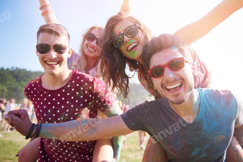 Preview: Group of friends having fun at the festival