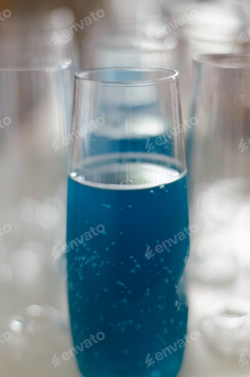 Preview: Closeup shot of a blue drink in the glass
