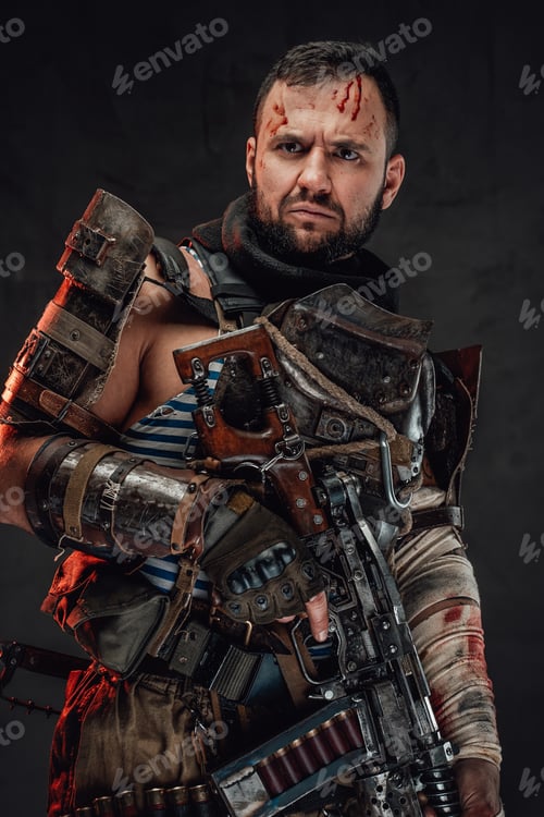 Preview: Serious survival poses in dark background holding shotgun