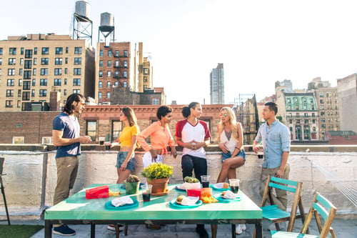 Preview: Group of friends having party on a rooftop