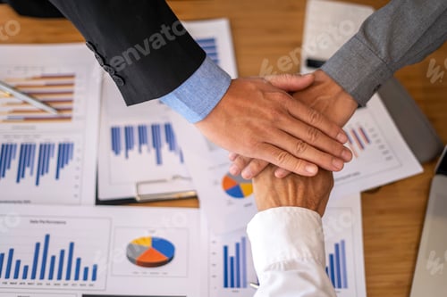 Preview: Business people join hands together during their meetings brainstrom. success and winning concept -