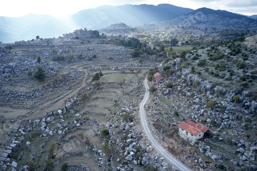 Preview: Aerial view of the road in mountain valley.