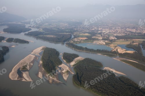 Preview: Aerial view of Fraser River during a hazy summer day
