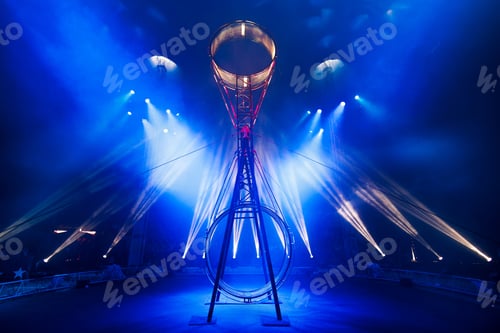 Preview: Circus equipment with colorful spotlights. Rays of light in the circus arena. Wheel of death.