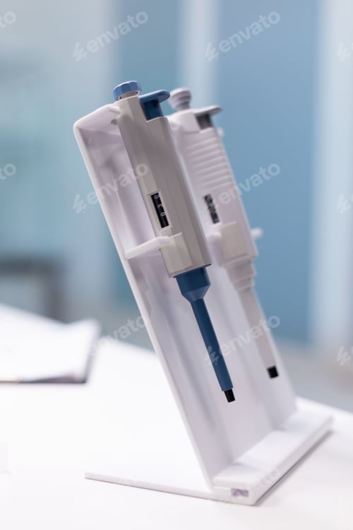 Preview: Medical micropipette standing on table ready for microbiology scientific test experiment