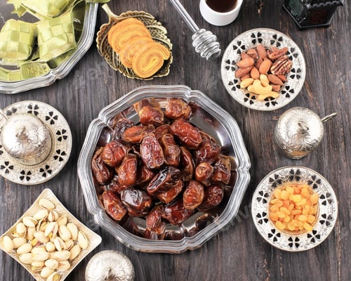 Preview: Ramadan Food and Drink Concept with Copy Space on Wooden Table. Dates Fruit