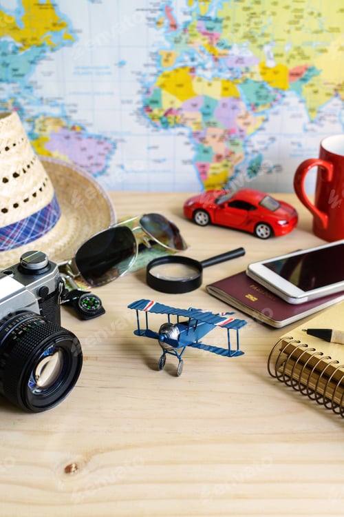 Preview: Travel and vacation accessories on wooden background