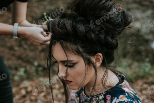 Preview: Woman with Dark Braided Hair and Floral Dress