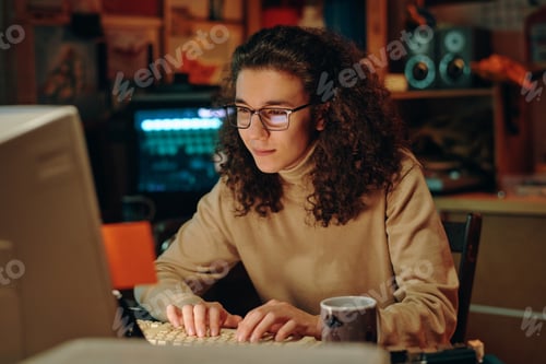 Preview: Young programmer developing computer program