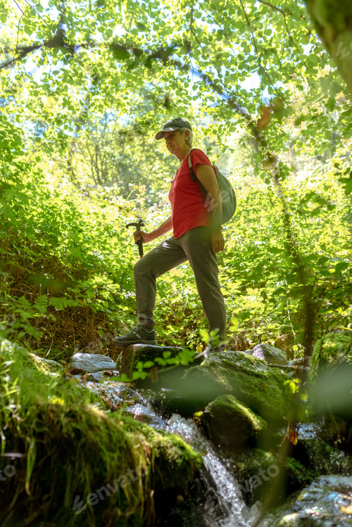 Preview: older woman hiking
