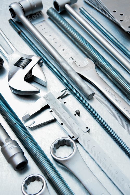 Preview: Metal tools on the scratched metal background.