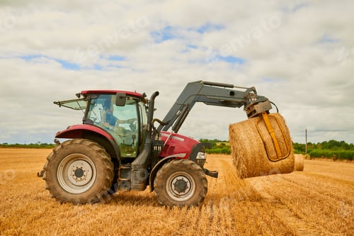 Preview: Stacking bales of hay