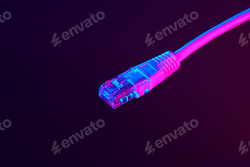 Preview: Modern technology network cable in neon light.