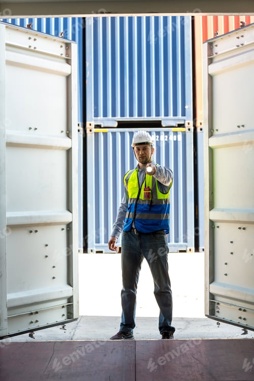 Preview: Foreman or worker work at Container cargo site check up goods in container.