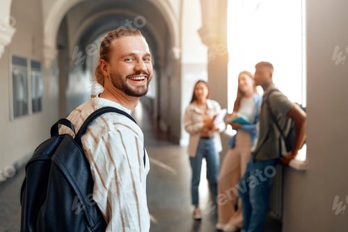 Preview: Student with backpack in university hallway, representing modern college experience