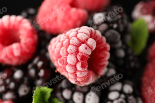 Preview: Many different frozen berries and mint on background, top view