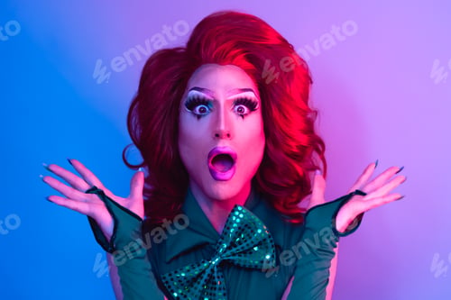 Preview: Happy drag queen having fun acting surprised in front of camera - LGBTQ concept