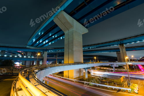 Preview: Traffic and over head highway at night