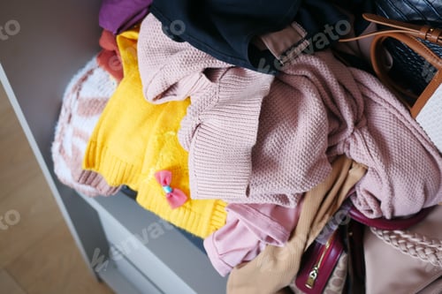 Preview: Messy clothes in a drawer at home