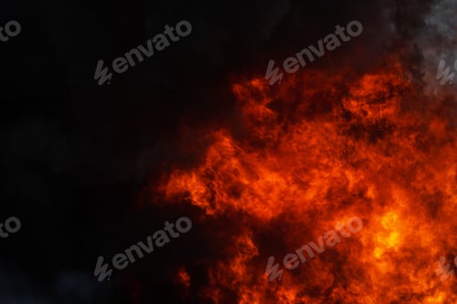 Preview: Dangerous Strong Red Flames of Fire and Dramatic Black Clouds of Smoke Covered Sky