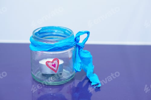 Preview: Tea light candle in a glass jar