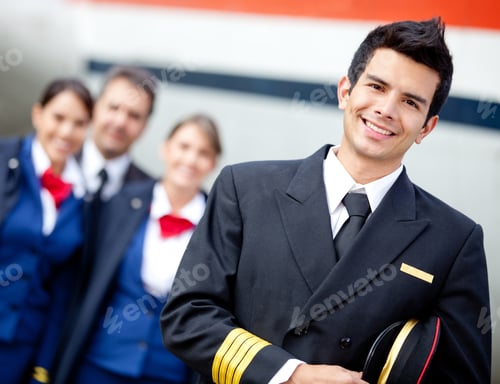 Preview: Captain Pilot With Cabin Crew And An Airplane At The Background