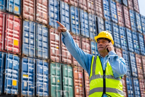 Preview: male engineers in a container shipping company Consulting