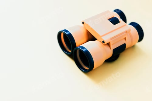 Preview: Binoculars isolated on yellow background - vintage effect style pictures
