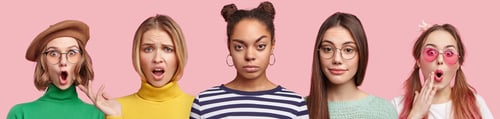 Vista previa: Portrait of mixed race female students expresses great surprisment and bewildermnet, being dissatisf