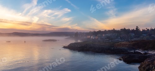 Preview: Rocky Shore on the Pacific Ocean Coast. Foggy Sunset. Victoria, Vancouver Island, BC, Canada.