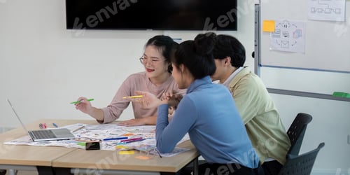 Preview: Creative UX Developer and UI Designer Team Brainstorming Ideas in Modern Office Setting with