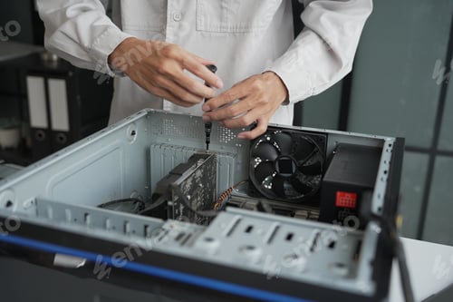 Preview: Computer Hardware dissemblers fixing computer PC.