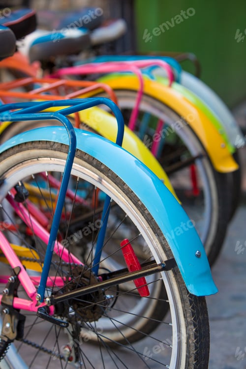 Preview: Rear view of colorful bicycles in Guatape, Colombia
