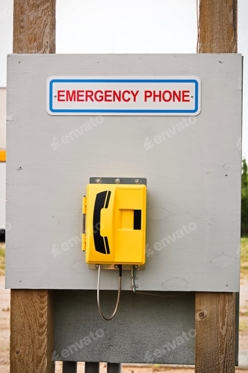 Preview: An emergency phone located on a wooden billboard