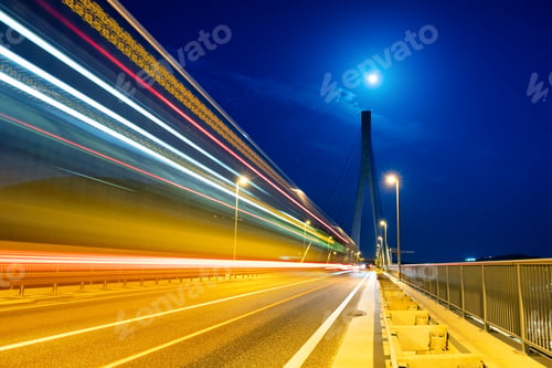 Preview: Blured lights and bridge. Architectural landscape