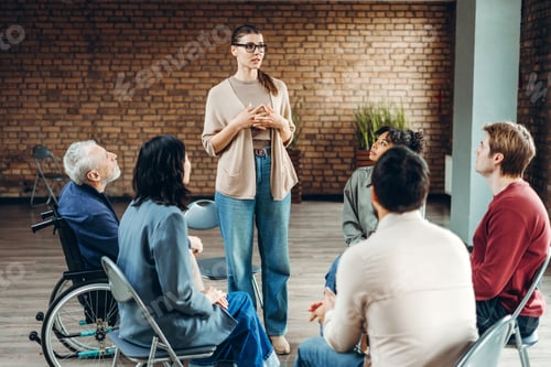 Preview: Counselor leading group therapy session for diverse patients