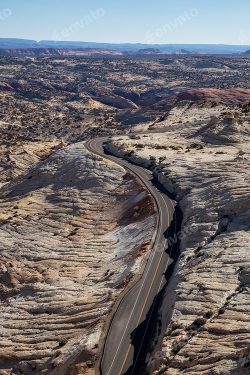 Preview: Scenic road in the desert during a vibrant sunny day