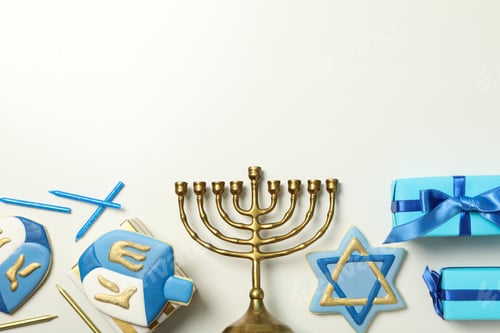 Preview: Hanukkiah, gingerbread and gift boxes on white background, space for text