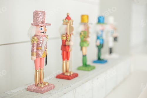 Preview: Pink red green gold blue white sparkly Christmas nutcrackers on white background