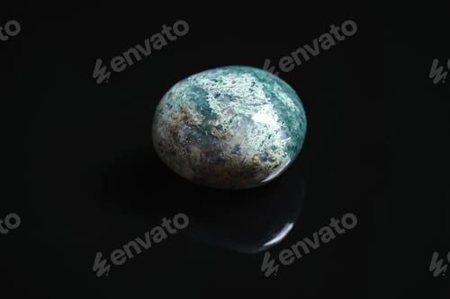 Preview: Beautiful moss agate gemstone on black background