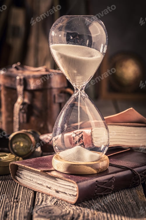 Preview: Hourglass and journal as a concept of travel memories