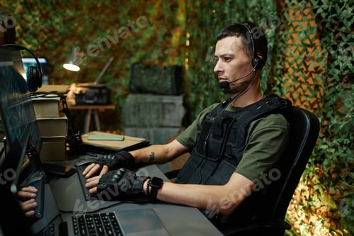 Preview: Young serious officer of command and control center reporting about situation