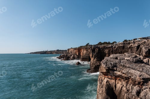 Preview: Amazing views of the ocean with waves and cliffs in Portugal. Summer vacation and travel