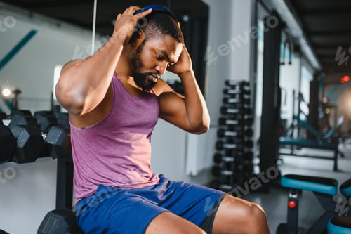 Preview: healthy african american man resting after workout.