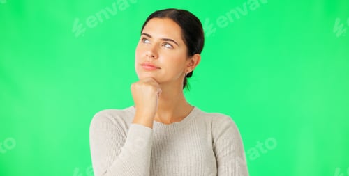 Preview: Face, thinking and option with a woman on a green screen background in studio to consider a decisio