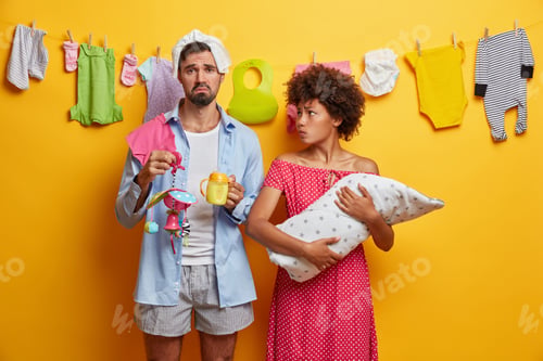 Preview: Parents with Baby Items on Clothes Line