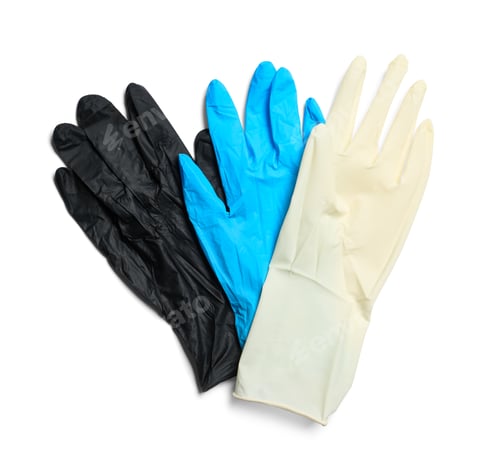 Preview: Different medical gloves on white background, top view
